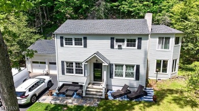 GORGEOUS inside and out! Spectacular views of Lake Mohawk from - photo 2