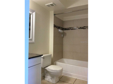 **COMPLETELY UPGRADED KITCHEN AND BATHROOMS** Lake View with - photo 16