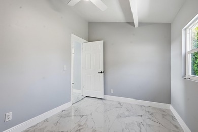 This charming single family home is tucked away in the back - photo 21