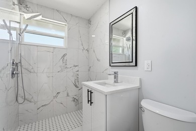 This charming single family home is tucked away in the back - photo 22