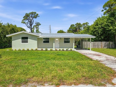 This charming single family home is tucked away in the back - photo 29
