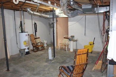 Estate Home with 46 acres, stocked pond, two bay RV bldg and - photo 31