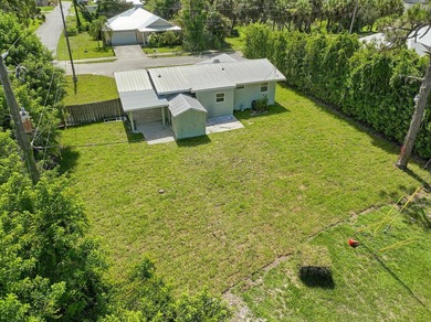 This charming single family home is tucked away in the back - photo 34