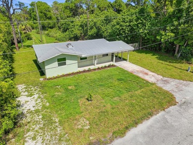 This charming single family home is tucked away in the back - photo 36
