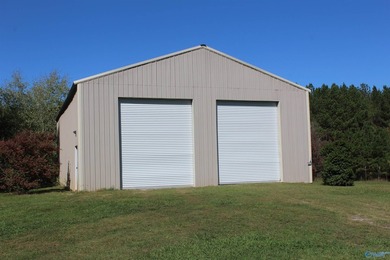 Estate Home with 46 acres, stocked pond, two bay RV bldg and - photo 37