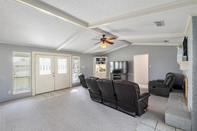 Nestled in a serene golf course community surrounded by a - photo 12