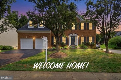 Welcome to this beautifully maintained brick-front home in the - photo 1