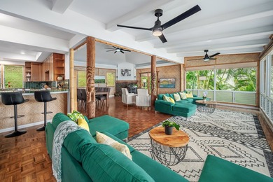 Set just a few feet from the gentle waters of Anini Beach, this - photo 3