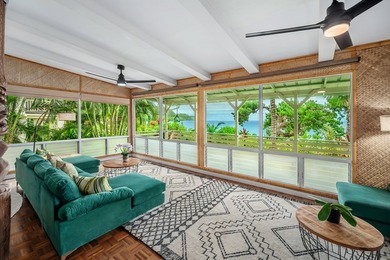 Set just a few feet from the gentle waters of Anini Beach, this - photo 4