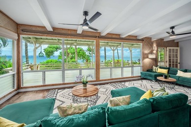 Set just a few feet from the gentle waters of Anini Beach, this - photo 6