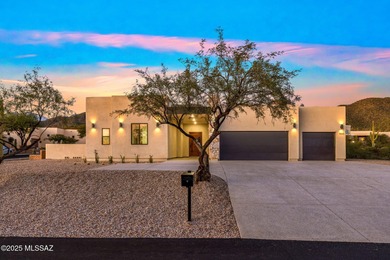 A shining new home in the Catalina Foothills. Located within