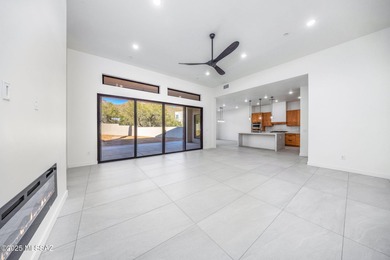 A shining new home in the Catalina Foothills. Located within