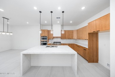 A shining new home in the Catalina Foothills. Located within