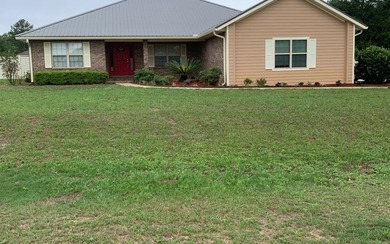 Move in ready, Beautiful brick home on large lot with new vinyl - photo 1
