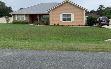 Move in ready, Beautiful brick home on large lot with new vinyl - photo 2