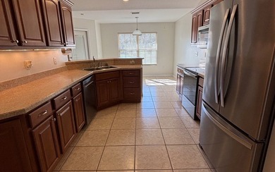 Move in ready, Beautiful brick home on large lot with new vinyl - photo 3