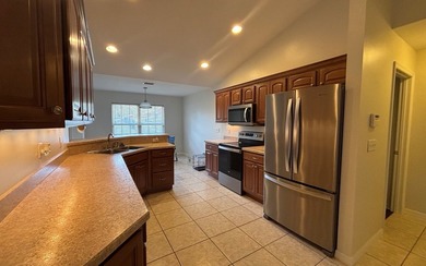 Move in ready, Beautiful brick home on large lot with new vinyl - photo 4