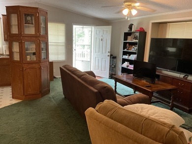 The owner has taken great care of the home and looks great. The - photo 8