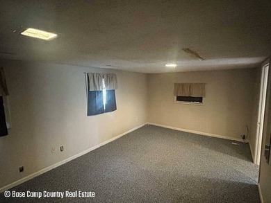 This 1 bed, 1 bath stone home sits on nearly half an acre. It is - photo 11