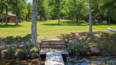 Escape to this charming four-season cabin on highly sought-after - photo 13