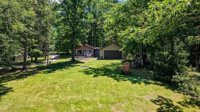 Escape to this charming four-season cabin on highly sought-after - photo 15