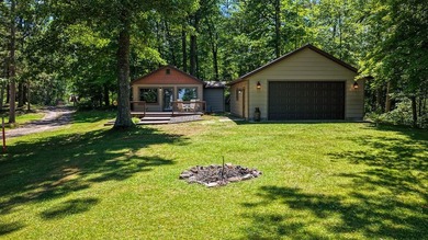 Escape to this charming four-season cabin on highly sought-after - photo 16