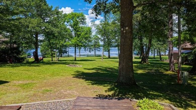 Escape to this charming four-season cabin on highly sought-after - photo 17
