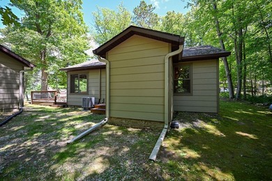 Escape to this charming four-season cabin on highly sought-after - photo 24