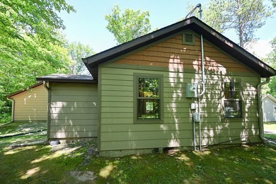 Escape to this charming four-season cabin on highly sought-after - photo 25