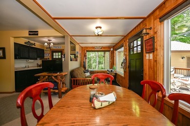 Escape to this charming four-season cabin on highly sought-after - photo 32