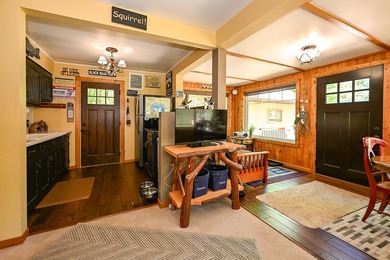 Escape to this charming four-season cabin on highly sought-after - photo 38