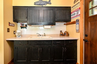 Escape to this charming four-season cabin on highly sought-after - photo 39