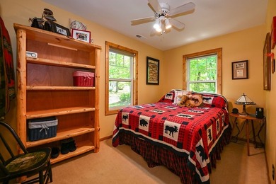 Escape to this charming four-season cabin on highly sought-after - photo 44