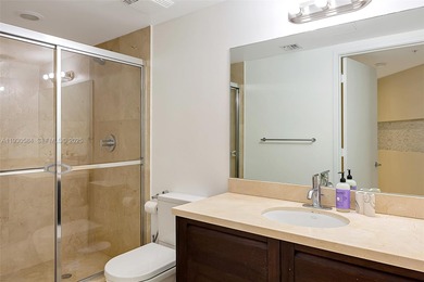 Enjoy elevated coastal living on prestigious Collins Avenue in