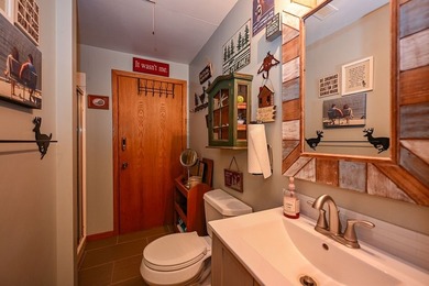 Escape to this charming four-season cabin on highly sought-after - photo 46