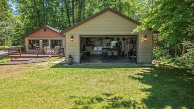 Escape to this charming four-season cabin on highly sought-after - photo 50