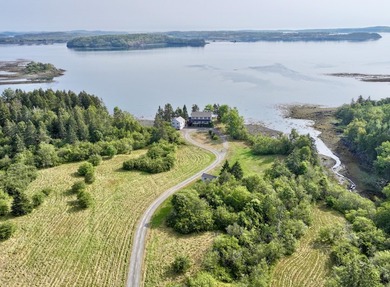 Situated in a spectacular rock-bound oceanfront setting, this - photo 3