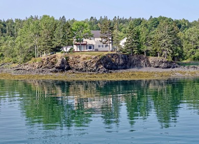 Situated in a spectacular rock-bound oceanfront setting, this - photo 4