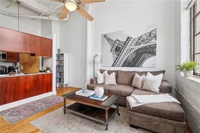 Charming, light-filled condo at the historic Cotton Mill comes