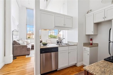 Charming, light-filled condo at the historic Cotton Mill comes