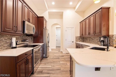 Welcome to this beautifully maintained pool home, ideally - photo 5