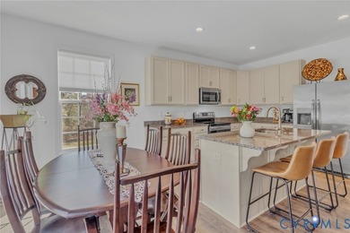 Welcome to 25 Essie Court - a 2022-built ranch-style home in the - photo 3
