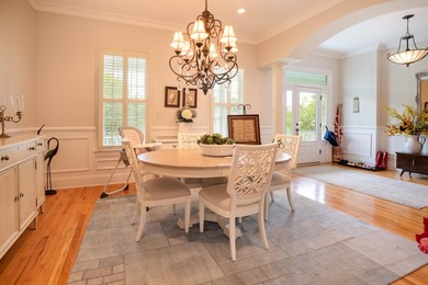 Welcome to this beautifully elevated Lowcountry-style home--the - photo 11