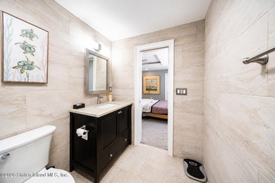 Welcome to 5434 Amboy Road - an exceptional legal two-family - photo 15
