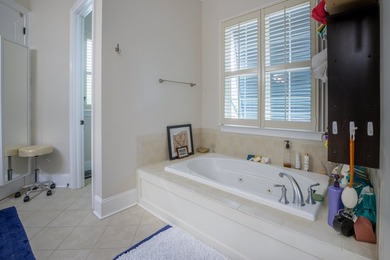 Welcome to this beautifully elevated Lowcountry-style home--the - photo 16