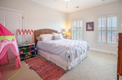 Welcome to this beautifully elevated Lowcountry-style home--the - photo 17