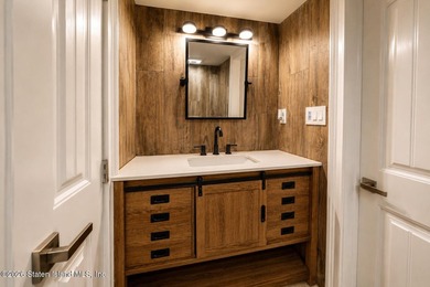 Welcome to 5434 Amboy Road - an exceptional legal two-family - photo 30