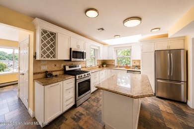 Welcome to 5434 Amboy Road - an exceptional legal two-family - photo 39
