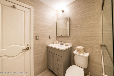 Welcome to 5434 Amboy Road - an exceptional legal two-family - photo 45