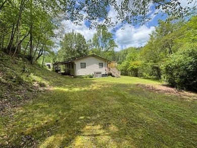 Welcome to your Creekfront Oasis, located in the sought-after